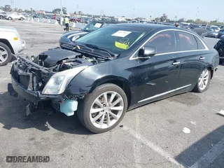 2013 Cadillac XTS Luxury with VIN 2G61P5S3XD9207062, listed as a IAAI auction lot 41613845 with 108,472 mi miles. Bid and sale history available at carsss.com. Image 19.