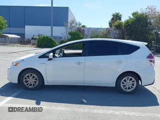 2016 Toyota Prius v Two with VIN JTDZN3EU5GJ051939, listed as a IAAI auction lot 42162040 with 275,213 mi miles. Bid and sale history available at carsss.com. Image 14.