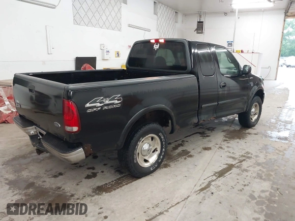 2000 Ford F-150 XL with VIN 1FTRX18W9YNB67215, listed as a IAAI auction lot 42558112 with 118,628 mi miles and . Bid and sale history available at DreamBid. Image 4.