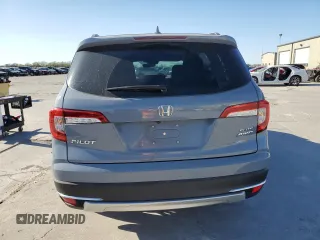 2022 Honda Pilot Elite z VIN 5FNYF6H0XNB060420, wystawiony jako Copart lot #50035415 z przebiegiem 37 288 mil mil oraz Szkoda całkowita • Salvage title. Historia ofert i sprzedaży dostępna na DreamBid. Obrazek 6.
