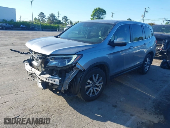 2020 Honda Pilot EX-L z VIN 5FNYF5H51LB016163, wystawiony jako IAAI lot #42030430 z przebiegiem 65 383 mil mil oraz . Historia ofert i sprzedaży dostępna na DreamBid. Obrazek 19.