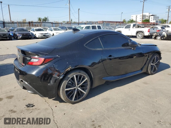 2023 Toyota 86 z VIN JF1ZNBB13P9750286, wystawiony jako Copart lot #57180095 z przebiegiem 11 630 mil mil oraz Szkoda całkowita • Salvage title. Historia ofert i sprzedaży dostępna na DreamBid. Obrazek 3.