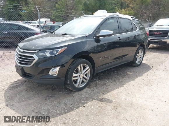 2019 Chevrolet Equinox Premier z VIN 2GNAXYEX5K6143922, wystawiony jako IAAI lot #42134219 z przebiegiem 105 496 mil mil oraz . Historia ofert i sprzedaży dostępna na DreamBid. Obrazek 21.