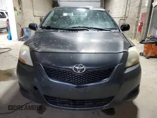 2009 Toyota Yaris z VIN JTDBT903391318992, wystawiony jako Copart lot #58753615 z przebiegiem 286 924 mil mil oraz Tytuł czysty. Historia ofert i sprzedaży dostępna na DreamBid. Obrazek 5.