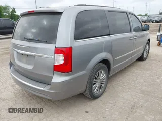 2013 Chrysler Town & Country Touring L with VIN 2C4RC1CG7DR779762, listed as a IAAI auction lot 42118866 with 151,833 mi miles and . Bid and sale history available at DreamBid. Image 4.