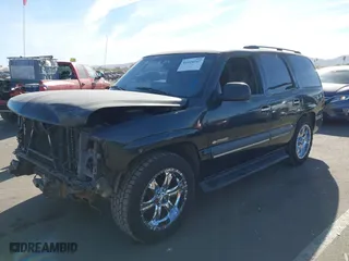 2003 Chevrolet Tahoe LS with VIN 1GNEC13V03R112315, listed as a IAAI auction lot 41424247 with 256,017 mi miles. Bid and sale history available at carsss.com. Image 2.