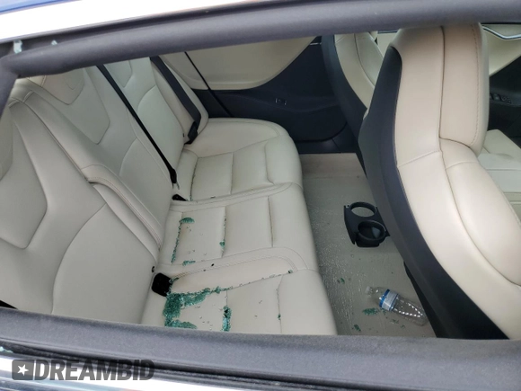 2019 Tesla Model S 100D с VIN 5YJSA1E41KF332086, выставлен на аукционе Copart как лот 74513814 с пробегом Не указан миль и Списание • Salvage title. История ставок и продаж доступна на DreamBid. Изображение 10.