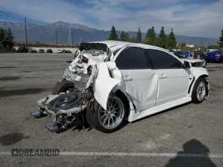 2014 Mitsubishi Lancer Evolution GSR with VIN JA32W8FV2EU019253, listed as a Copart auction lot 86615084 with 104,894 mi miles and Salvage Title. Bid and sale history available at carsss.com. Image 3.