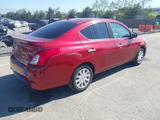 2016 Nissan Versa S with VIN 3N1CN7AP6GL901795, listed as a IAAI auction lot 42019769 with 121,561 mi miles. Bid and sale history available at carsss.com. Image 4.