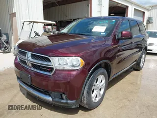 2012 Dodge Durango SXT with VIN 1C4RDHAG6CC301302, listed as a IAAI auction lot 42594428 with 134,495 mi miles and . Bid and sale history available at DreamBid. Image 2.