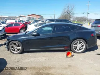 2015 Tesla Model S 85D z VIN 5YJSA1E24FF114180, wystawiony jako IAAI lot #41832583 z przebiegiem 152 008 mil mil oraz . Historia ofert i sprzedaży dostępna na DreamBid. Obrazek 14.