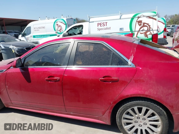 2012 Cadillac CTS Premium z VIN 1G6DP5E3XC0116312, wystawiony jako IAAI lot #41804403 z przebiegiem 148 570 mil mil oraz . Historia ofert i sprzedaży dostępna na DreamBid. Obrazek 14.