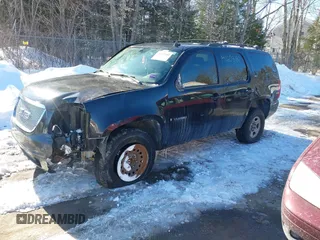 2007 GMC Yukon SLT with VIN 1GKFK13077R123021, listed as a IAAI auction lot 41603180 with 247,945 mi miles. Bid and sale history available at carsss.com. Image 2.