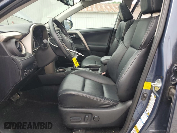 2014 Toyota RAV4 Limited with VIN 2T3DFREV9EW221527, listed as a Copart auction lot 61225505 with 104,286 mi miles and Salvage title. Bid and sale history available at DreamBid. Image 7.