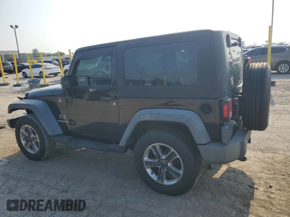 2009 Jeep Wrangler X with VIN 1J4FA24159L772540, listed as a Copart auction lot 62183815 with 179,628 mi miles and Salvage title. Bid and sale history available at DreamBid. Image 2.
