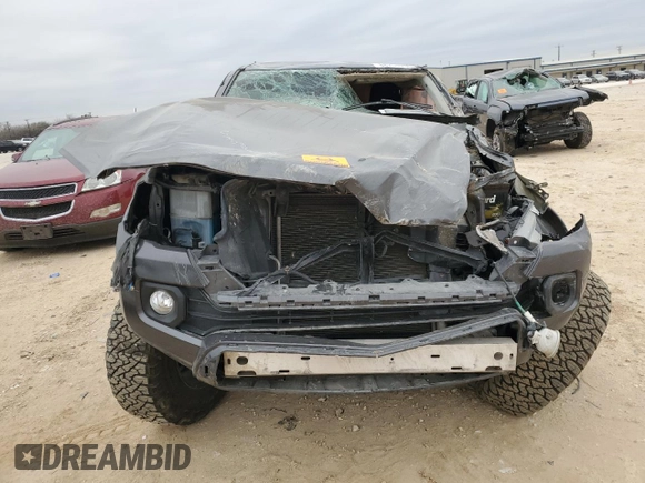 2021 Toyota Tacoma SR z VIN 3TMCZ5AN4MM449761, wystawiony jako Copart lot #88751705 z przebiegiem Nie podano mil oraz Nie do naprawy • Non repairable. Historia ofert i sprzedaży dostępna na DreamBid. Obrazek 5.