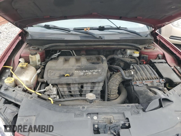 2013 Chrysler 200 Touring z VIN 1C3CCBBB4DN577755, wystawiony jako Copart lot #55904845 z przebiegiem 138 423 mil mil oraz Szkoda całkowita • Salvage title. Historia ofert i sprzedaży dostępna na DreamBid. Obrazek 11.