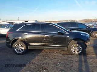 2020 Cadillac XT5 Premium Luxury AWD with VIN 1GYKNDRSXLZ209939, listed as a IAAI auction lot 41166099 with 41,682 mi miles. Bid and sale history available at carsss.com. Image 13.