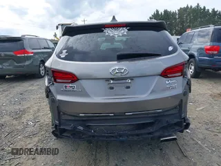 2018 Hyundai Santa Fe 2.4L z VIN 5NMZUDLB4JH073857, wystawiony jako IAAI lot #42200208 z przebiegiem 127 038 mil mil oraz . Historia ofert i sprzedaży dostępna na DreamBid. Obrazek 17.