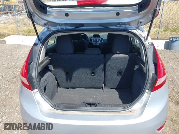 2013 Ford Fiesta SE with VIN 3FADP4EJ9DM157685, listed as a IAAI auction lot 42145511 with 101,331 mi miles. Bid and sale history available at carsss.com. Image 13.