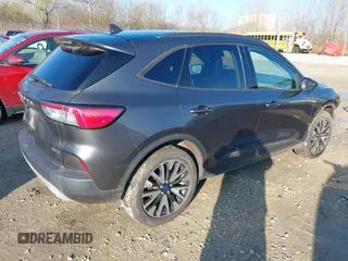2020 Ford Escape SE Sport Hybrid with VIN 1FMCU9BZ3LUC23532, listed as a IAAI auction lot 40749554 with 96,291 mi miles and . Bid and sale history available at DreamBid. Image 4.