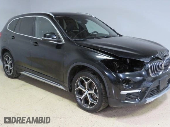 2018 BMW X1 xDrive28i z VIN WBXHT3C35J5L33173, wystawiony jako Copart lot #56427465 z przebiegiem 33 352 mil mil oraz Szkoda całkowita • Salvage title. Historia ofert i sprzedaży dostępna na DreamBid. Obrazek 1.