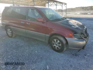2005 Kia Sedona LX with VIN KNDUP132056683645, listed as a Copart auction lot 86584104 with 0 mi miles and Salvage Title. Bid and sale history available at carsss.com. Image 4.