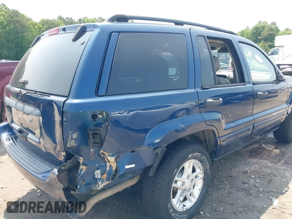 2002 Jeep Grand Cherokee Laredo with VIN 1J8GW48SX2C270339, listed as a IAAI auction lot 42390842 with Not provided miles and . Bid and sale history available at DreamBid. Image 6.