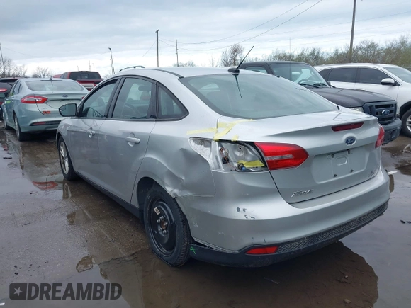 2016 Ford Focus SE with VIN 1FADP3F28GL386303, listed as a IAAI auction lot 41905397 with 158,112 mi miles. Bid and sale history available at carsss.com. Image 3.