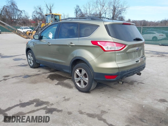 2013 Ford Escape SE with VIN 1FMCU9GX1DUB69236, listed as a IAAI auction lot 41575494 with 122,075 mi miles and . Bid and sale history available at DreamBid. Image 3.