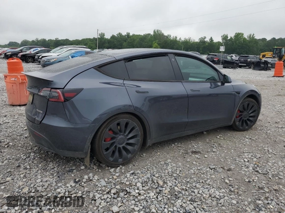 2022 Tesla Model Y Performance with VIN 7SAYGDEF7NF507184, listed as a Copart auction lot 58329875 with 98,320 mi miles and Salvage title. Bid and sale history available at DreamBid. Image 3.