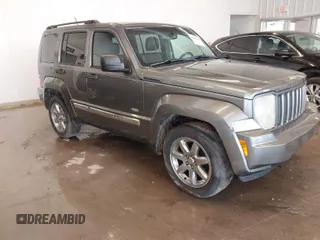 2012 Jeep Liberty Sport with VIN 1C4PJMAK9CW176792, listed as a IAAI auction lot 41685594 with 213,748 mi miles. Bid and sale history available at carsss.com. Image 1.