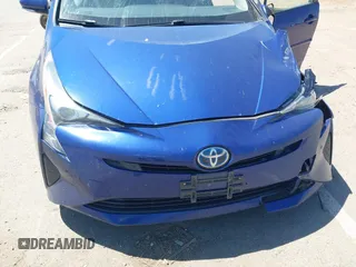 2017 Toyota Prius Two with VIN JTDKBRFUXH3044163, listed as a IAAI auction lot 42196278 with 117,610 mi miles and . Bid and sale history available at DreamBid. Image 6.