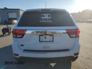 2013 Jeep Grand Cherokee Overland with VIN 1C4RJECG9DC644823, listed as a Copart auction lot 83232414 with 193,205 mi miles and Salvage Title. Bid and sale history available at carsss.com. Image 6.
