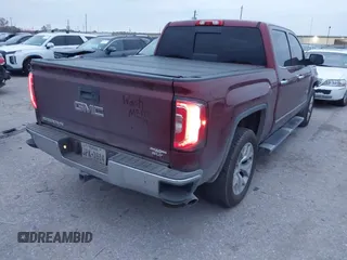 2017 GMC Sierra 1500 SLT with VIN 3GTP1NEC7HG396222, listed as a IAAI auction lot 41262525 with 150,740 mi miles and . Bid and sale history available at DreamBid. Image 4.