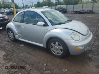 2001 Volkswagen Beetle GLX with VIN 3VWDD21C21M406898, listed as a Copart auction lot 55597675 with 104,597 mi miles and Salvage Title. Bid and sale history available at DreamBid. Image 4.