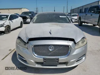 2012 Jaguar XJ with VIN SAJWA1CB0CLV23002, listed as a Copart auction lot 52804915 with 149,331 mi miles and Salvage title. Bid and sale history available at DreamBid. Image 5.