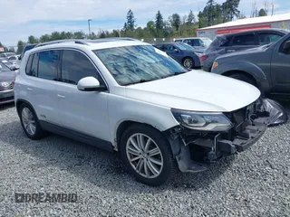 2016 Volkswagen Tiguan S with VIN WVGBV7AXXGW580052, listed as a IAAI auction lot 41444015 with 102,165 mi miles and . Bid and sale history available at DreamBid. Image 1.