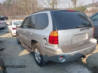 2005 GMC Envoy SLT with VIN 1GKDT13S752251920, listed as a IAAI auction lot 41670725 with 192,509 mi miles. Bid and sale history available at carsss.com. Image 3.