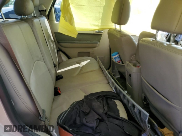 2009 Mercury Mariner Premier with VIN 4M2CU87GX9KJ25554, listed as a Copart auction lot 59949775 with Not provided miles and Salvage title. Bid and sale history available at DreamBid. Image 11.