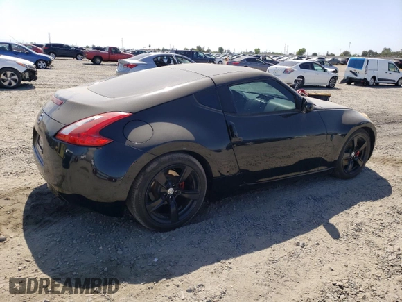 2011 Nissan 370Z Touring z VIN JN1AZ4EHXBM553057, wystawiony jako Copart lot #58557165 z przebiegiem 110 714 mil mil oraz Szkoda całkowita • Salvage title. Historia ofert i sprzedaży dostępna na DreamBid. Obrazek 3.