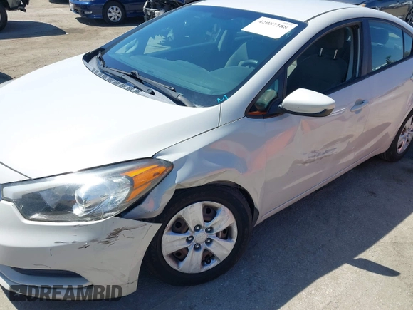 2014 Kia Forte LX with VIN KNAFK4A63E5115830, listed as a IAAI auction lot 42087188 with 111,660 mi miles. Bid and sale history available at carsss.com. Image 6.