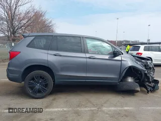 2019 Honda Passport Sport with VIN 5FNYF8H22KB012323, listed as a IAAI auction lot 41880476 with 153,341 mi miles and . Bid and sale history available at carsss.com. Image 13.