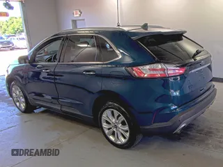 2020 Ford Edge Titanium z VIN 2FMPK3K91LBB37761, wystawiony jako IAAI lot #42829390 z przebiegiem 90 117 mil mil oraz . Historia ofert i sprzedaży dostępna na DreamBid. Obrazek 30.