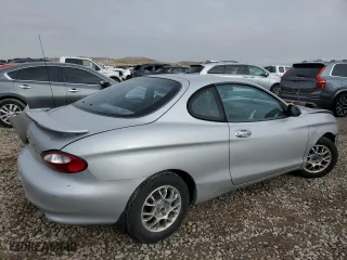 1999 Hyundai Tiburon with VIN KMHJG24F8XU126762, listed as a Copart auction lot 88747725 with 51,296 mi miles and Salvage Title. Bid and sale history available at carsss.com. Image 3.