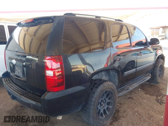 2007 Chevrolet Tahoe LS with VIN 1GNFC13C07R266418, listed as a IAAI auction lot 42435750 with 321,712 mi miles and . Bid and sale history available at DreamBid. Image 4.