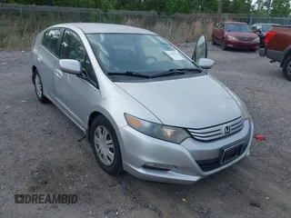2010 Honda Insight LX with VIN JHMZE2H52AS038807, listed as a IAAI auction lot 42120846 with 242,816 mi miles and . Bid and sale history available at DreamBid. Image 6.