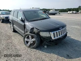 2011 Jeep Grand Cherokee Overland Summit with VIN 1J4RR6GT3BC686143, listed as a Copart auction lot 59218685 with 155,059 mi miles and Salvage title. Bid and sale history available at DreamBid. Image 14.