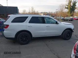 2015 Dodge Durango SXT with VIN 1C4RDJAG1FC745974, listed as a IAAI auction lot 41392820 with 124,861 mi miles and . Bid and sale history available at DreamBid. Image 14.