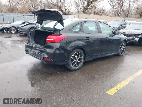 2015 Ford Focus SE with VIN 1FADP3F22FL240476, listed as a IAAI auction lot 41739722 with 159,179 mi miles. Bid and sale history available at carsss.com. Image 4.